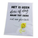 Kaart met gelukspoppetje